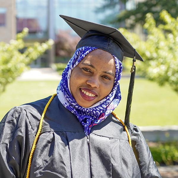 grad wearing black regalia