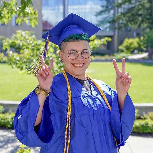 Grad in blue regalia