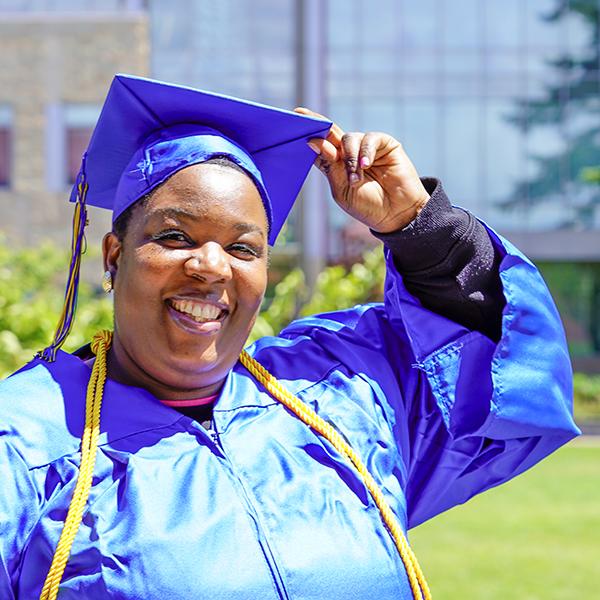 grad in blue regalia