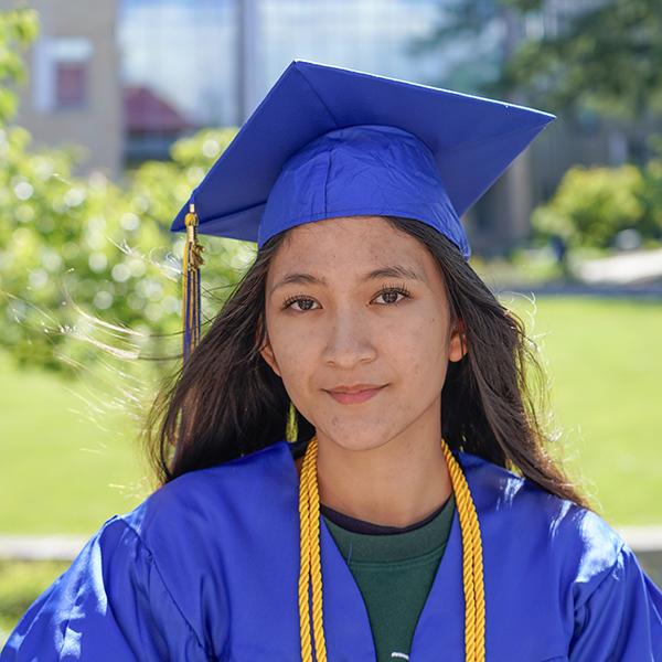 grad in blue regalia